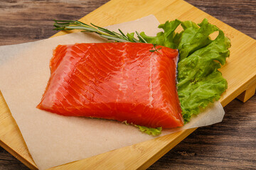 Salmon piece steak served rosemary