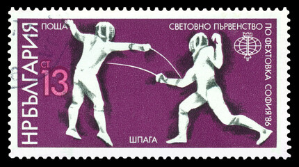 Postage stamp.  Fencers. Sword.