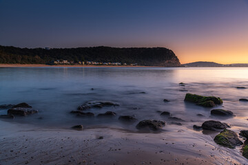 Gentle Sunrise with Clear Skies at the Seaside