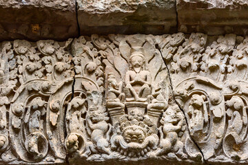 lintel with a praying hermit on a lion's head in Preah Khan temple, in Angkor Thom, Siem Reap, Cambodia