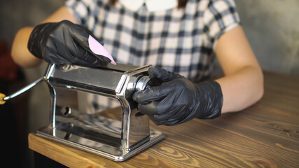 Artisan works with polymer clay in workshop. Small business concept.