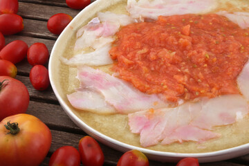 cod carpaccio with tomato and olive oil