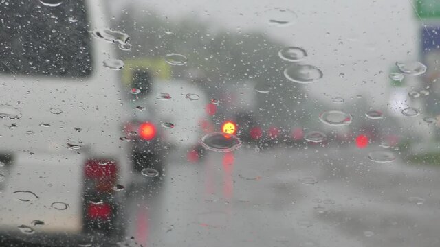 The screen of the smart phone with the navigator shows the traffic jam. Google maps on the smartphone screen in the car. 