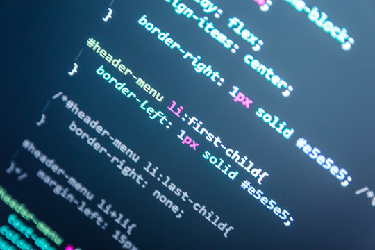 Wordpress theme code close up. Laptop screen with CSS code