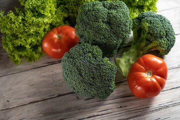 Vegetable still life with broccoli, tomatoes and salad