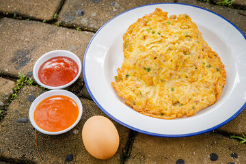 yellow fried egg with sauce