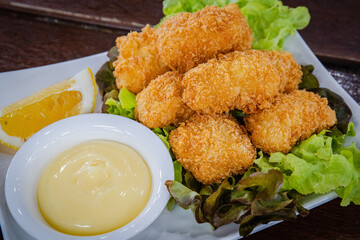 fried nugget snack with sauce