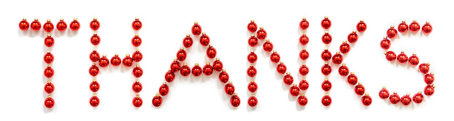 Red Christmas Ball Ornament Building English Word Thanks. Festive Christmas Decoration. White Isolated Background