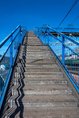 Stairs to the pedestrian crossing over the access roads at railway station