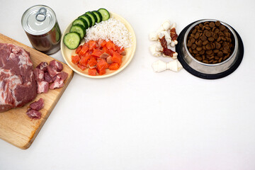 dog food includes dry pellets, treats and canned foods along with a natural diet of fresh meat, fish, rice and vegetables. choice between dry food and natural food