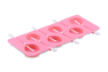 Pink silicone form isolated on white background. Lollipop cup, silicone mold, bakeware.