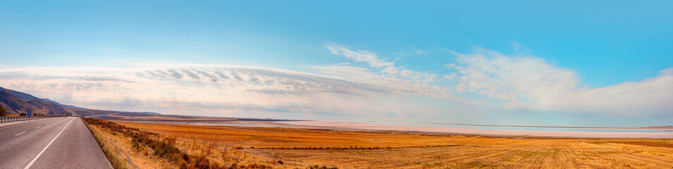 Beautiful landscape with panoramic view of pink Salt Lake and amazing white clouds - Ankara, Turkey