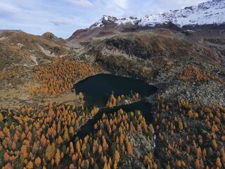 Aerial view of  the lake in swiss Val Viola - 389851893