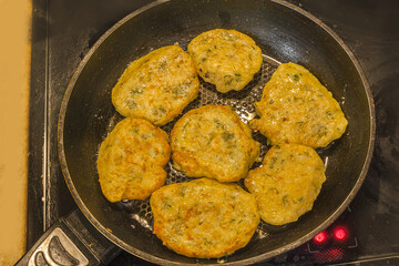 Vegetable pancakes in a pan