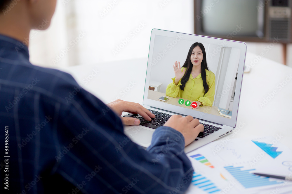 Aufkleber young asian business man working laptop computer blank display screen while report graph and chart p