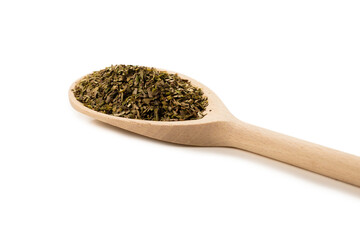 Oregano spice in wooden spoon isolated.