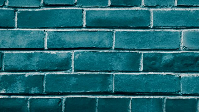 A movable wall of blue empty old brick.