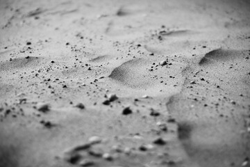 close up of a black and white sand