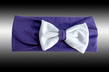 purple cloth head cover with white butterfly