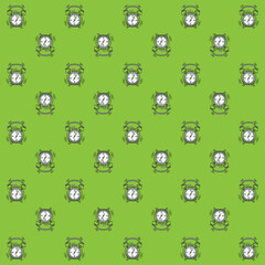 alarm clock pattern isolated in green background