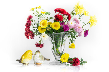 romantic still life with colorful autumn flowers and birds in love