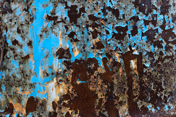 Photo background, texture of old rusty iron, worn peeling paint blue. space for text.