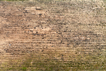 Brown wood colored plank wall texture background