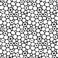 Rounded spots seamless pattern. Freehand pattern. Black and white abstract circles background. Vector illustration. Repeating spotty texture. Elegant ornament. Design textile, paper, wallpaper.