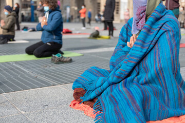 Yoga teachers protesting against the blockade and restrictions of Covid-19 in a square in Brescia,...