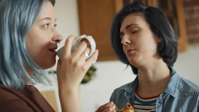 Video of lesbian couple talking during breakfast in the morning. Shot with RED helium camera in 8K.