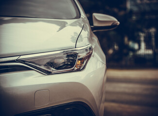 Car headlights. Exterior closeup detail.
