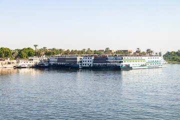 Fototapeta na wymiar A lot of Floating hotels (tourist boats) moored between Luxor and Aswan in central Egypt for lack of tourism