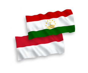 Flags of Indonesia and Tajikistan on a white background