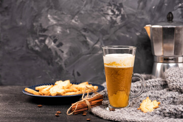 Pumpkin sweet spicy latte with autumn cookies