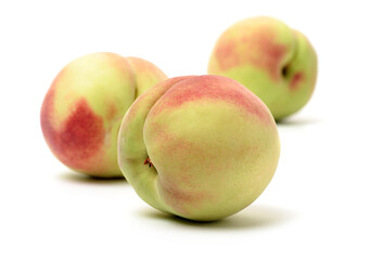 ripe peach on white background 