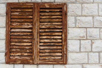 Old wooden closed shutter