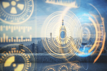 Double exposure of technology theme hologram and cityscape background. Concept of Hightech.