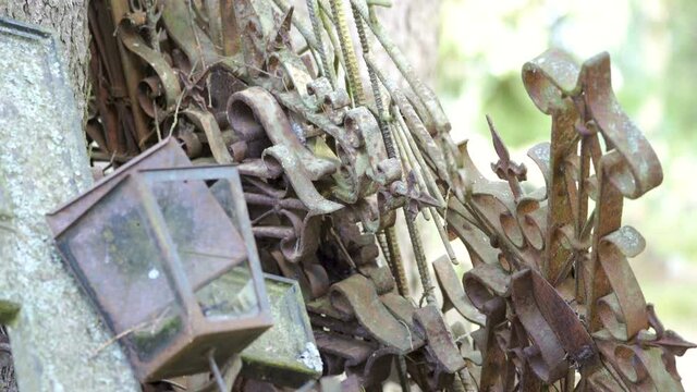 Lots of rusty cross signs inside the cemetery park with the sharp edges on it