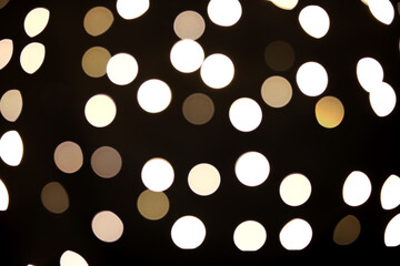 Dark abstract background with blurred lights