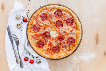 Delicious Italian pizza made according to this recipe. Sprinkled with mozzarella on top. Decomposed ingredients nvkolo. There is a place to write text. Professional photography of goods.