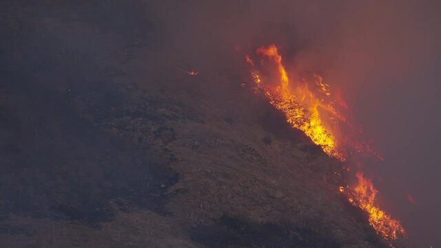 Large flames from wildfire working up mountainside in Utah as fire breaks out in Springville.