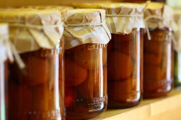 Jar of jam on a wooden shelf