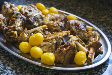 Meat and potato stew on a tray