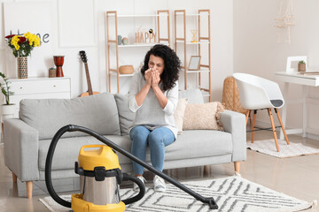 Allergic woman cleaning her flat - obrazy, fototapety, plakaty