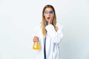 Young scientific woman isolated on white background with surprise and shocked facial expression