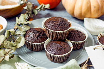 Gluten free and sugar free pumpkin bread cut into pieces. Pumpkin cake with dried fruits, poppy seeds and honey on a dark table. Copy space. Vegan Pumpkin Pastry
