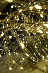 Beautiful lights of Christmas garland close-up. Greeting the New Year holiday