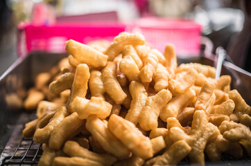 Patongo, a breakfast made from flour, eaten with coffee, is sold at Naklua market. Pattaya, Thailand