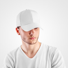 Template of a white baseball cap on a guy's head, headdress for protection from the sun, isolated on background.