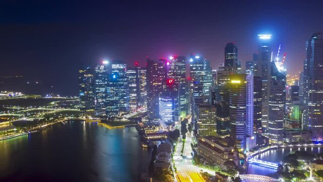 SINGAPORE - FEBRUARY 2: Hyper lapse Aerial drone view of Singapore business district and city, Marina Bay is bay located in the Central Area of Singapore on February 2, 2020 in Singapore.